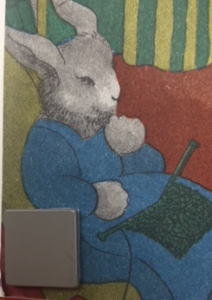 This image shows a book page with a page fluffer glued onto it