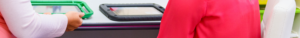A close-up shot of two people looking at tablet communication devices